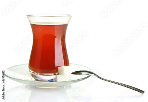 Photo: glass of Turkish tea, isolated on white glass of Turkish tea, isolated on white
