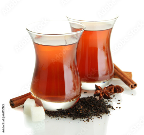 Photo: glasses of Turkish tea, isolated on white glasses of Turkish tea, isolated on white