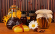 ingredients for soap making on brown background