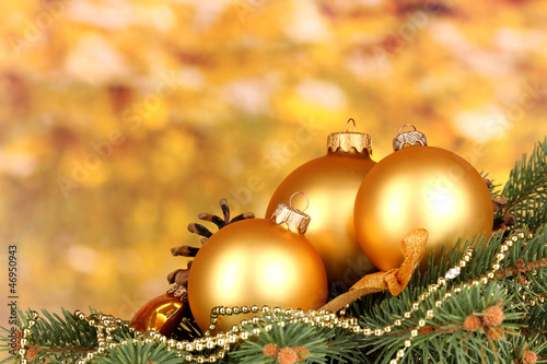 Photo: Christmas decoration on yellow background Christmas decoration on yellow background