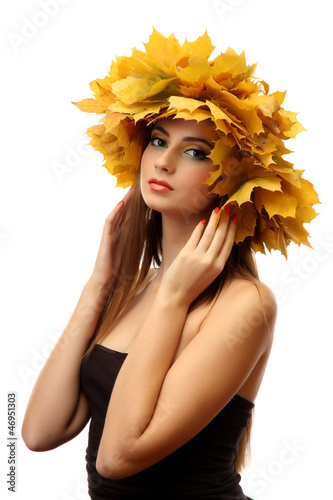 Photo: beautiful young woman with yellow autumn wreath, isolated beautiful young woman with yellow autumn wreath, isolated