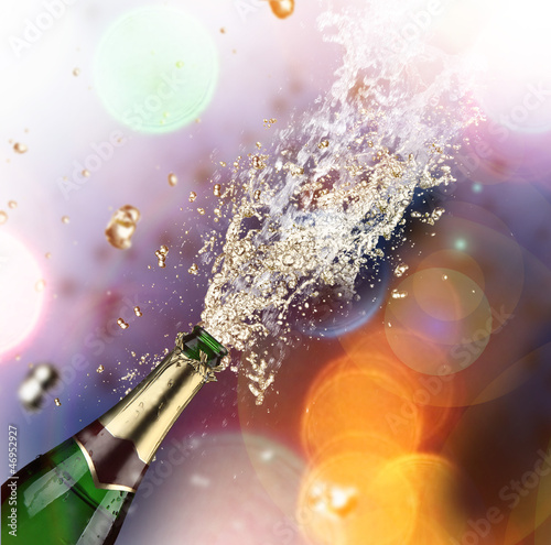 Photo: Close-up of champagne explosion Close-up of champagne explosion