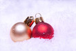 shiny colorful christmas balls lying on snow