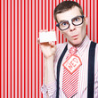 Nerdy 60s Salesman Holding Business Card