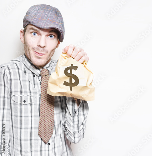 Photo: Smiling Businessman Holding Dollar Sign Money Bag Smiling Businessman Holding Dollar Sign Money Bag