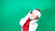Little girl Santa listening to music