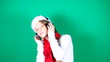 Little girl Santa listening to music