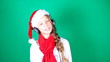 Little girl Santa listening to music