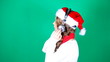 Little girl Santa listening to music