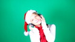 Little girl Santa listening to music