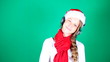 Little girl Santa listening to music