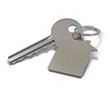 key and metal keyring with room for text over white