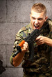 Portrait of an angry soldier aiming