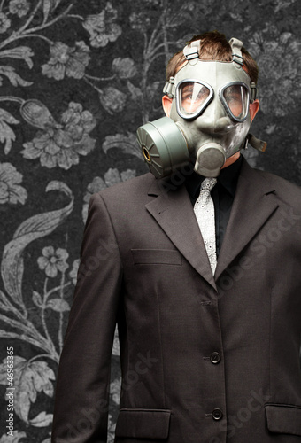 Photo: Businessman With Gas Mask Businessman With Gas Mask
