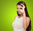 Young Woman Looking Through Imaginary Binocular