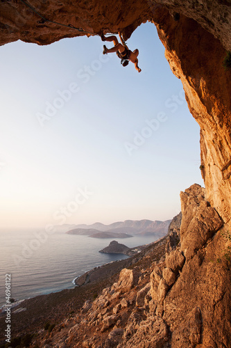 Photo: Rock climber at sunset, Kalymnos Island, Greece Rock climber at sunset, Kalymnos Island, Greece