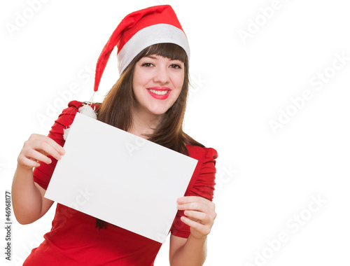 Photo: happy christmas woman holding a blank card happy christmas woman holding a blank card