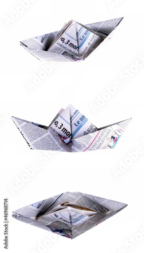 Photo: three views of a boat made with a newspaper page three views of a boat made with a newspaper page