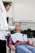 A female patient having an x-ray at the dentist