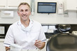 A male dentist in a dental surgery