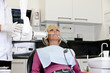 A female patient having an x-ray at the dentist