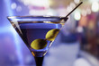 martini with green olives