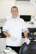 A male dentist in a dental surgery
