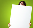 Portrait Of Man Holding a blank billboard