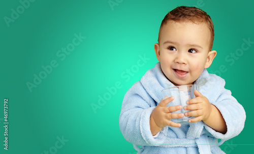 Photo: Portrait Of Baby Boy Holding A Glass Portrait Of Baby Boy Holding A Glass