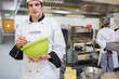 Chef mixing in the kitchen