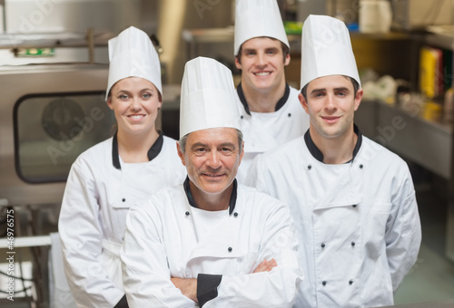 Photo: Smiling team of Chef's Smiling team of Chef's