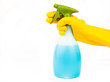 Hand holding spray bottle