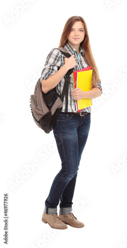 Photo: Nice female student smiling and looking at camera Nice female student smiling and looking at camera