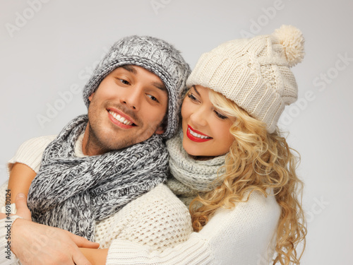 Photo: family couple in a winter clothes family couple in a winter clothes