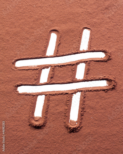 Photo: Hash mark drawn on cocoa powder Hash mark drawn on cocoa powder