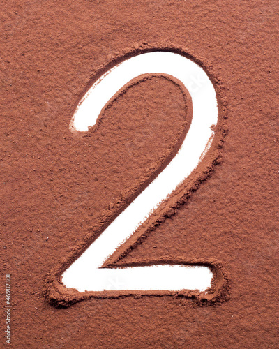 Photo: Number 2 made of cocoa powder Number 2 made of cocoa powder