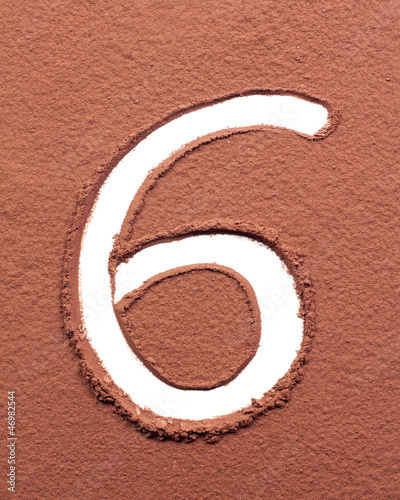 Photo: Number 6 made of cocoa powder Number 6 made of cocoa powder
