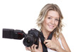 Photo: woman shooting with a camera woman shooting with a camera