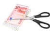 Scissors and banknote euro. On a white background.