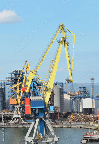 Photo: Cargo crane and grain dryer in port Odessa, Ukraine Cargo crane and grain dryer in port Odessa, Ukraine