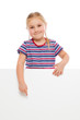 Little girl pointing at whiteboard.