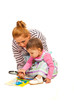 Mother teaching her daughter