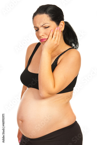 Photo: Pregnant woman with tooth ache Pregnant woman with tooth ache