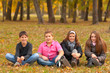 Teenage boys and girls having fun in the nature