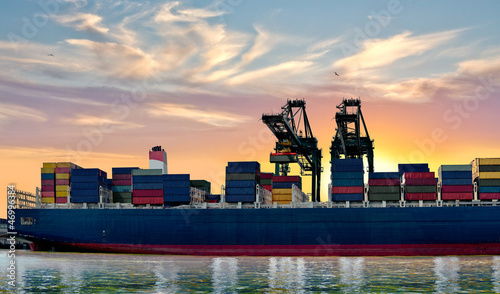 Photo: Cargo sea port. Sea cargo cranes. Cargo sea port. Sea cargo cranes.