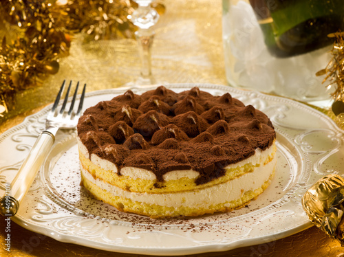 Photo: tiramisu over golden table tiramisu over golden table
