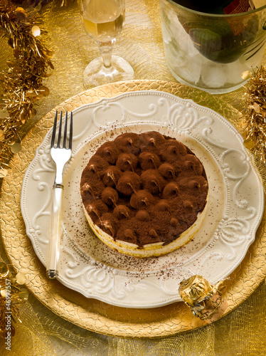 Photo: tiramisu over golden table tiramisu over golden table