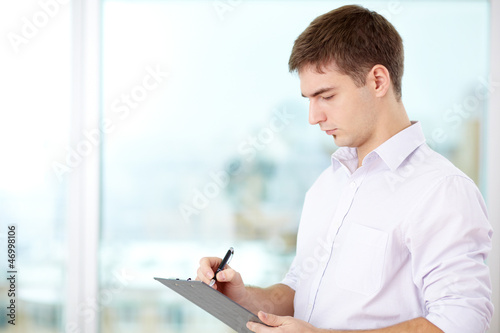 Photo: Making notes Making notes