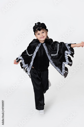 Photo: Girl wearing fancy dress of a black crow Girl wearing fancy dress of a black crow