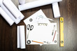 Photo: Tools and papers with sketches Tools and papers with sketches